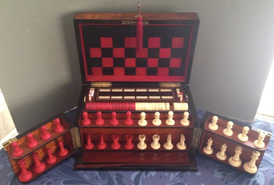 A Burr Walnut, Ebony edged Games Compendium Box