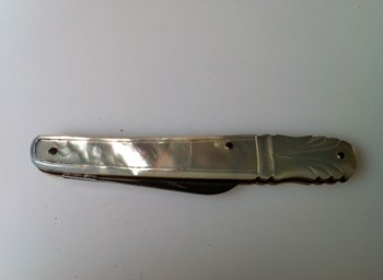 1850 Mother of Pear steel bladed folding knife.