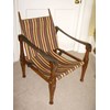 OAK CAMPAIGN OR SAFARI CHAIR BEING DISMANTABLE & RECENTLY REUPHOLSTERED C1910.