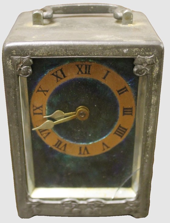 A 'Tudric' Pewter Liberty & Co. Carriage Clock by Archibald Knox with Case